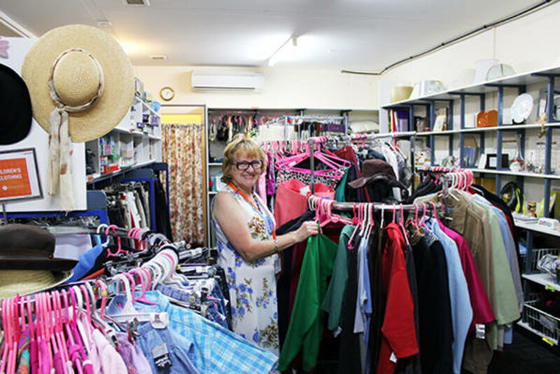 Image of the inside of the Eltham shop with volunteer racking